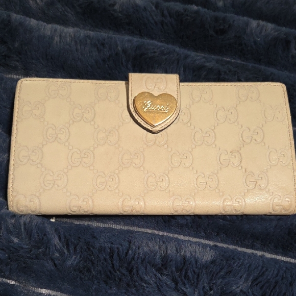 Gucci Handbags - Gucci Beige Wallet with Gold Accent